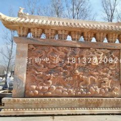 九龍影壁雕塑，晚霞紅石雕影壁