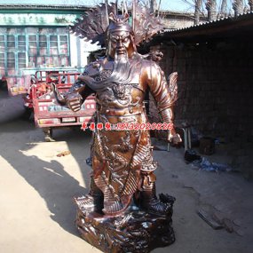 銅制的財(cái)神塑像